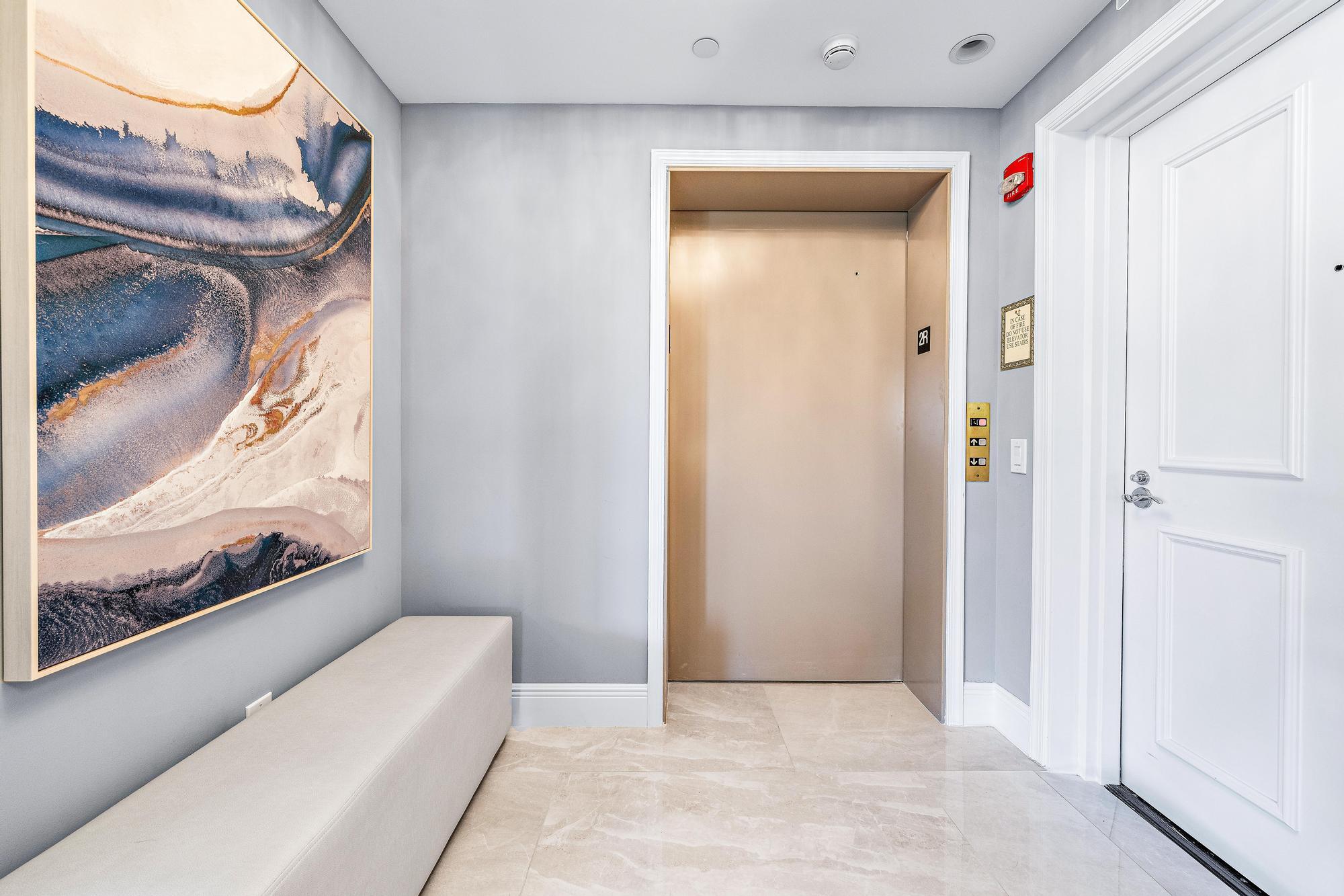 500 Highway 1, Unit 201 Jupiter, FL 33477 - Photo 3 of 38 a view of hallway with furniture and a window