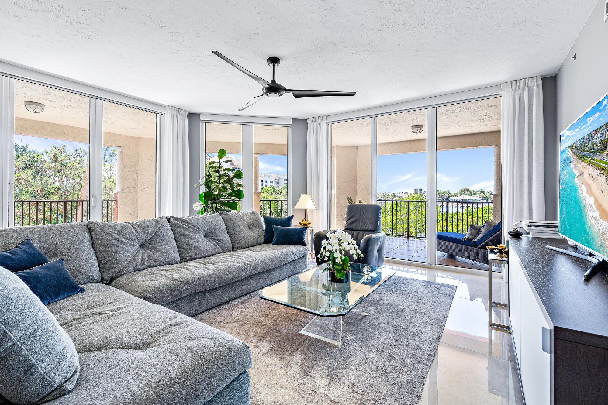 500 Highway 1, Unit 201 Jupiter, FL 33477 - Photo 6 of 38 a living room with furniture potted plant and a large window