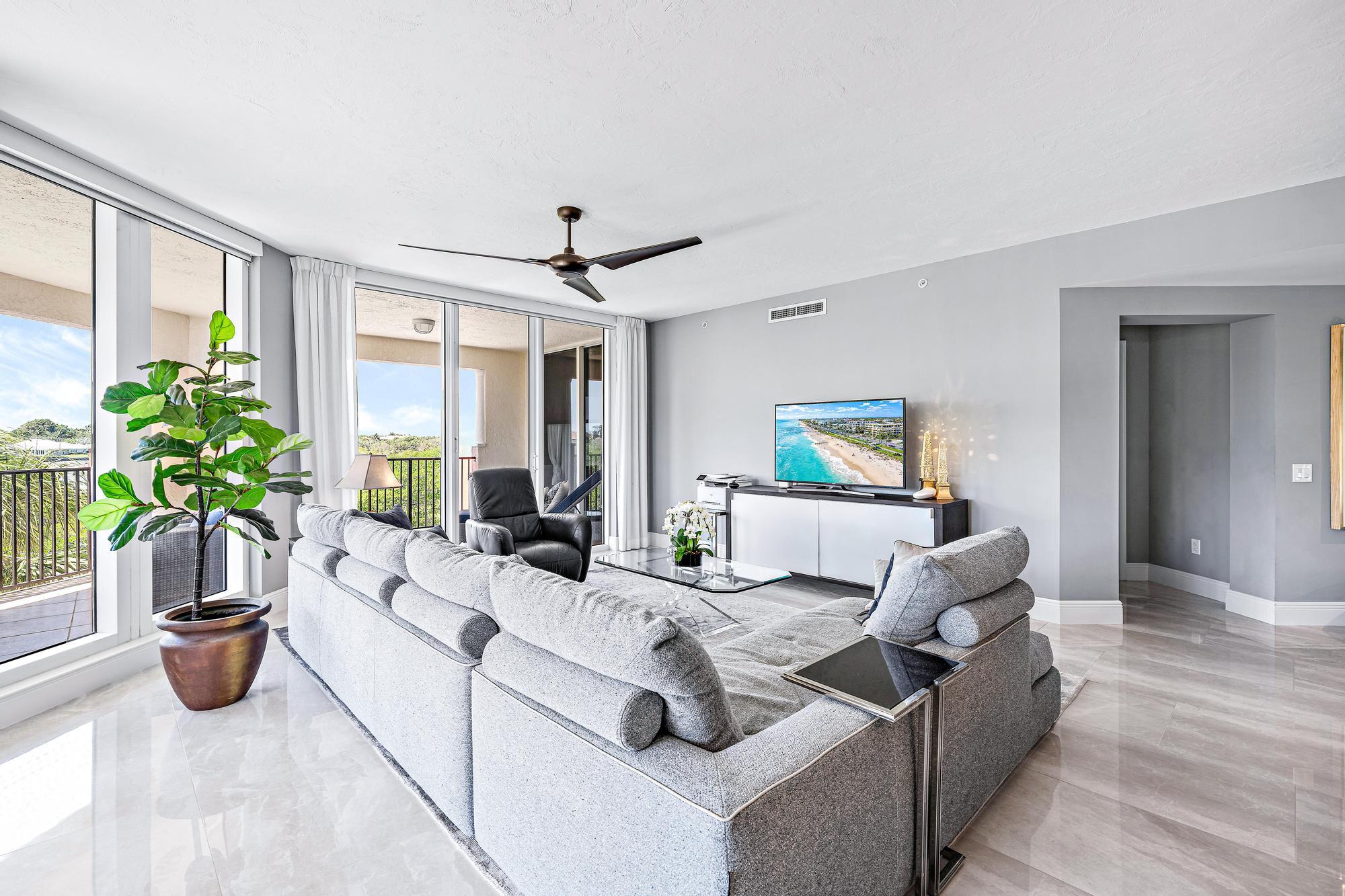 500 Highway 1, Unit 201 Jupiter, FL 33477 - Photo 8 of 38 a living room with furniture and a potted plant