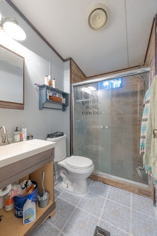 664 Hidden Oaks Drive Elgin, TX 78621 - Photo 17 of 35 a bathroom with a sink toilet and shower