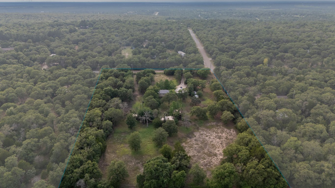 664 Hidden Oaks Drive Elgin, TX 78621 - Photo 3 of 35 a view of a dry yard