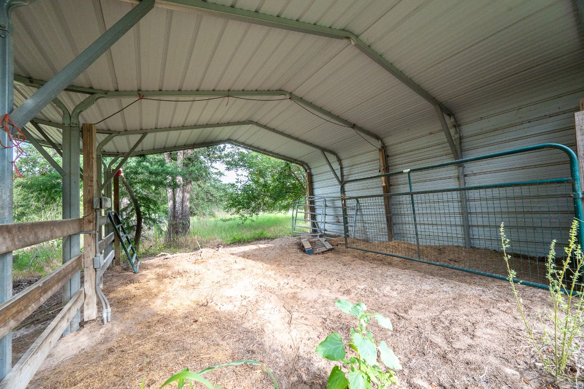 664 Hidden Oaks Drive Elgin, TX 78621 - Photo 31 of 35 a view of a backyard