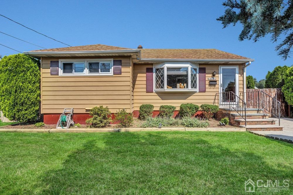 a front view of house with yard
