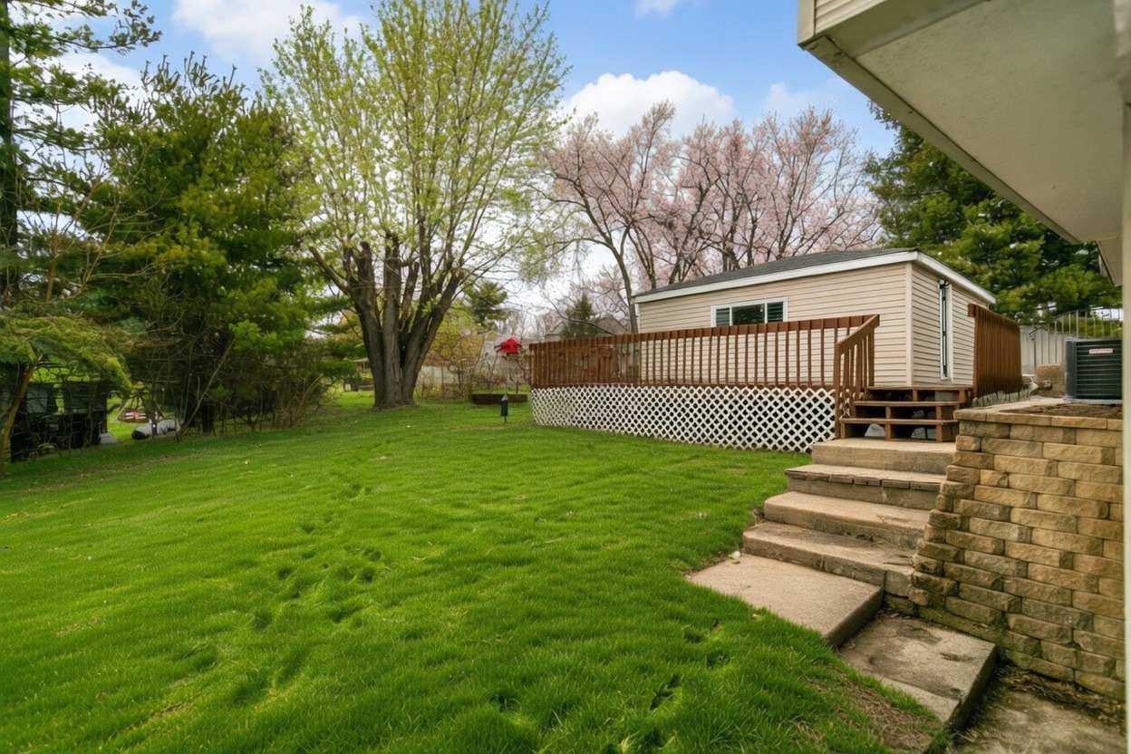 6305 Robert Road Cary, IL 60013 - Photo 2 of 23 a view of a patio with a yard