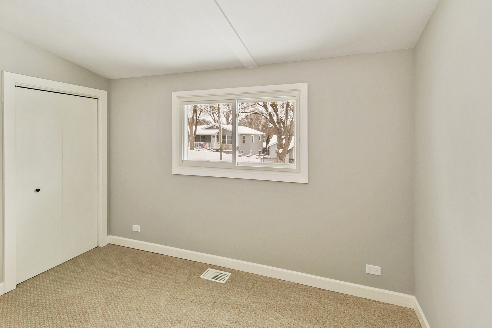 6305 Robert Road Cary, IL 60013 - Photo 10 of 23 an empty room with windows
