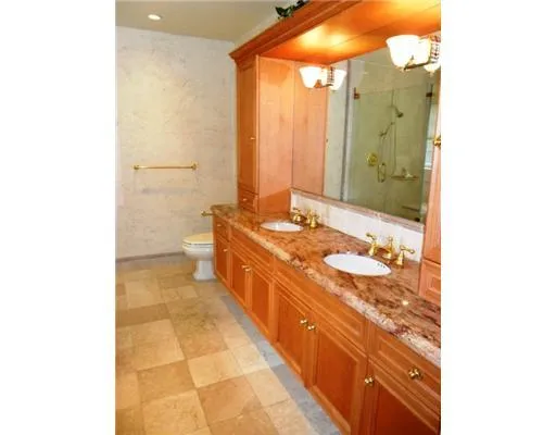 a spacious bathroom with a bathtub and a shower