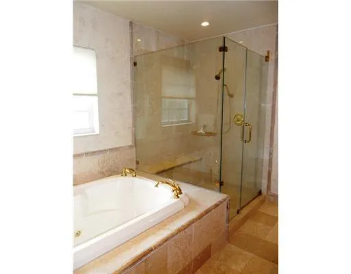 a bathroom with a sink a mirror and a toilet