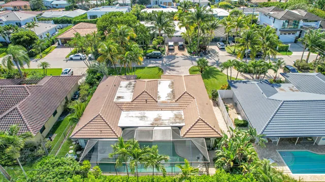 an aerial view of a house with a garden