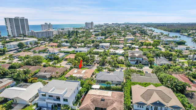 an aerial view of city and lake