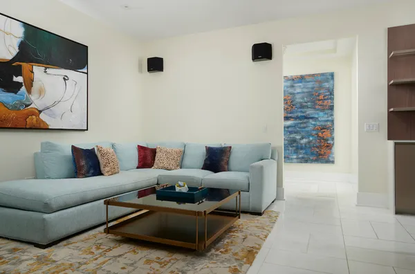 a living room with furniture and a couch