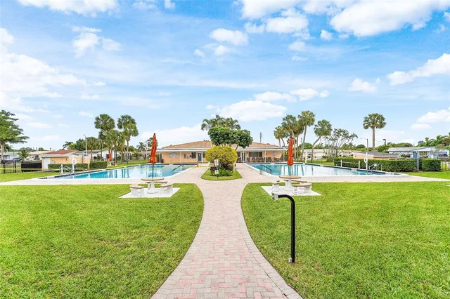 a view of a swimming pool and outdoor space