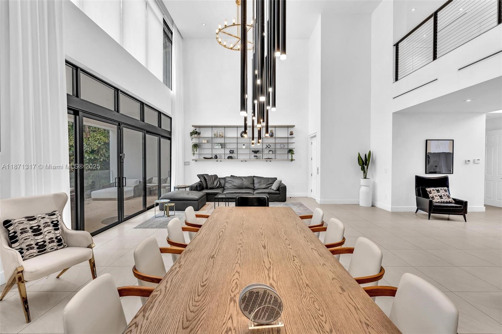 1350 98th Street Bay Harbor Islands, FL 33154 - Photo 11 of 46 a living room with furniture and large windows