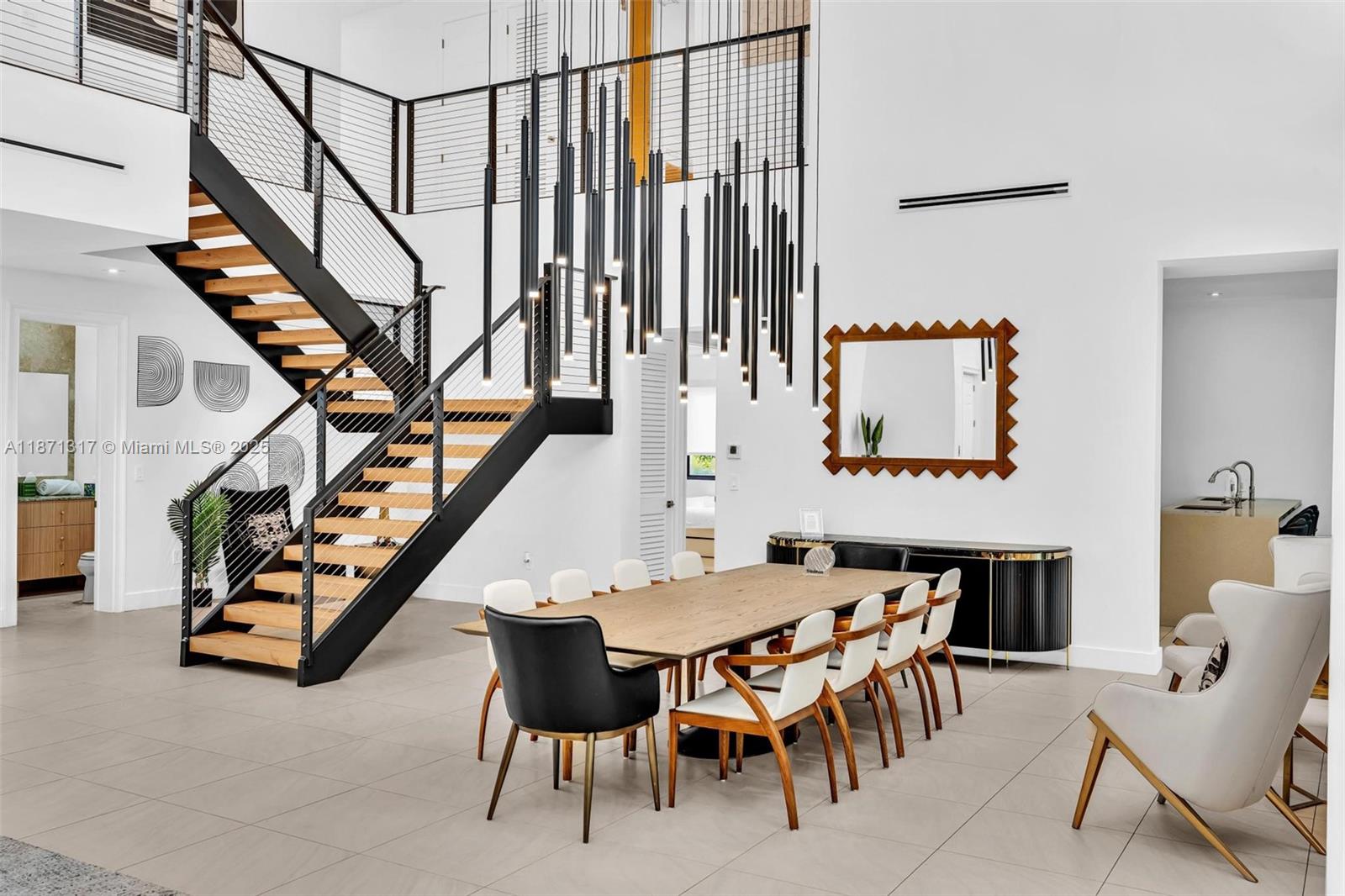 1350 98th Street Bay Harbor Islands, FL 33154 - Photo 13 of 46 a dining room with furniture and entryway