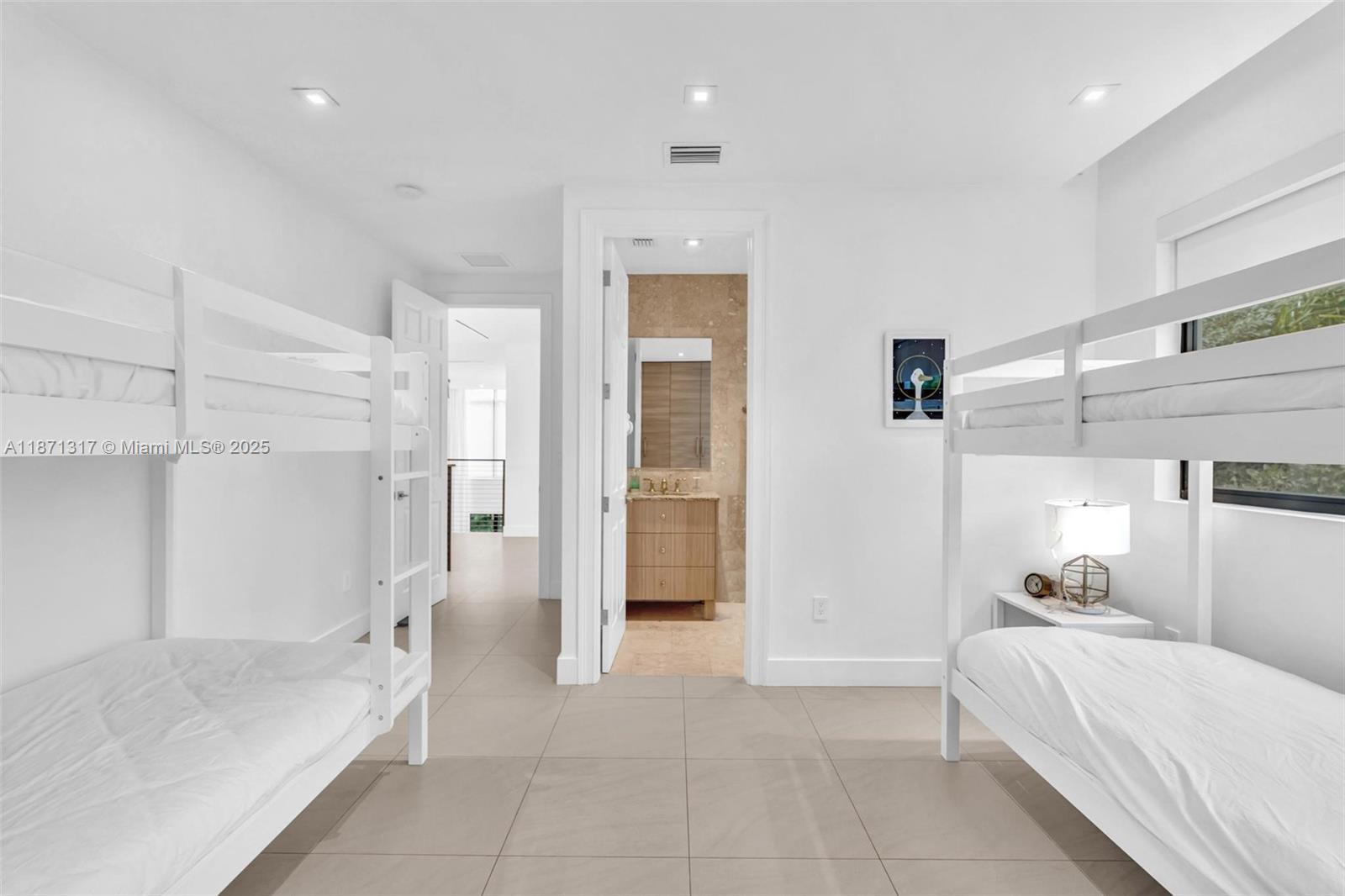 1350 98th Street Bay Harbor Islands, FL 33154 - Photo 30 of 46 a spacious bedroom with a bed and a shower