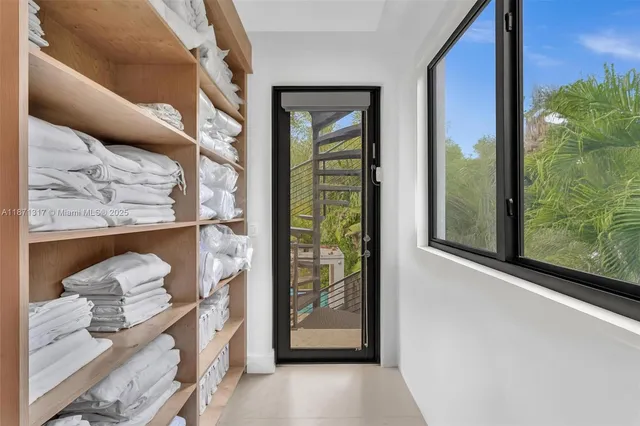 a bathroom with a granite countertop sink toilet a mirror and shower
