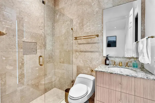 a view of a patio with couches chairs and a potted plant