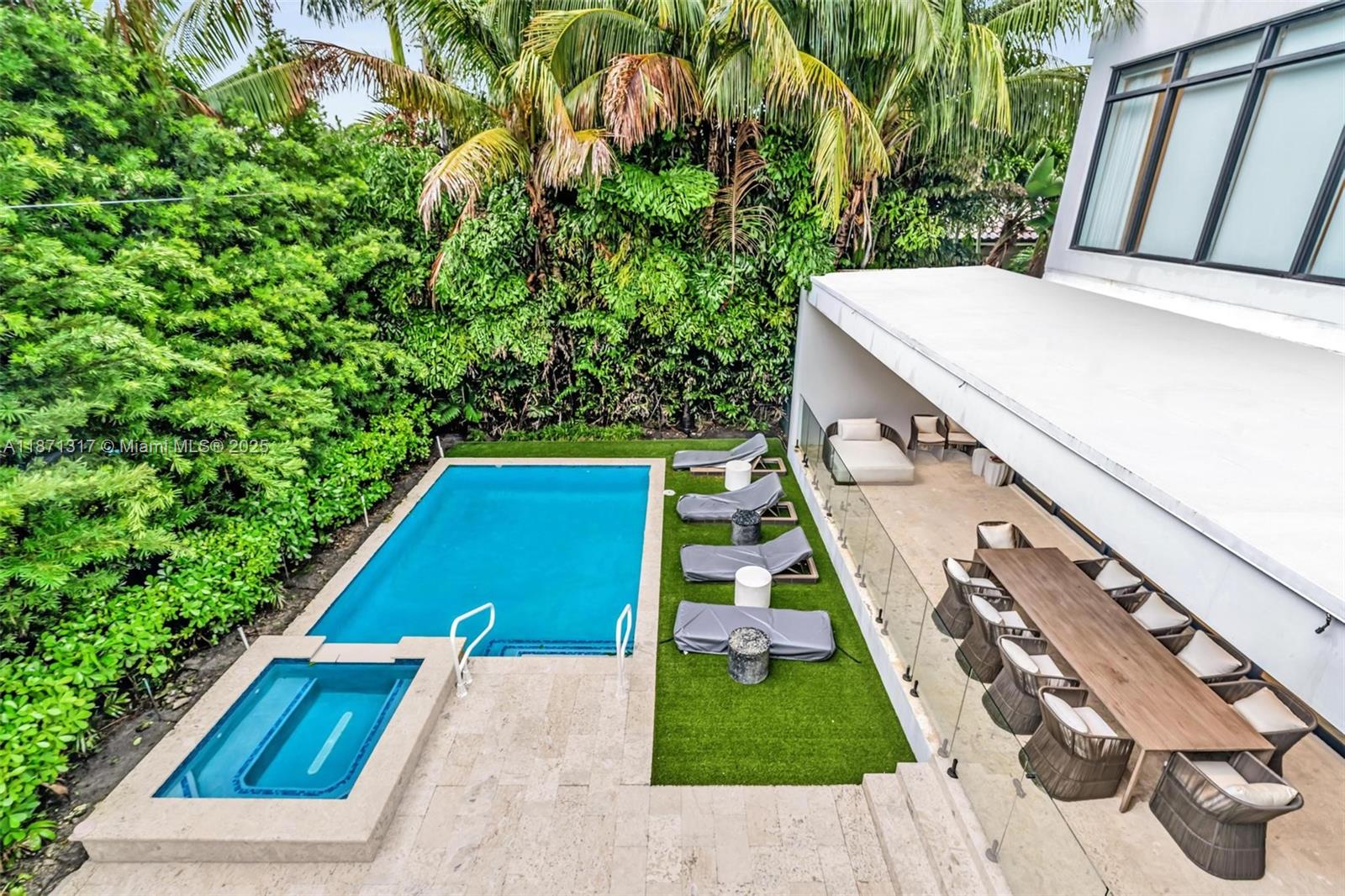 1350 98th Street Bay Harbor Islands, FL 33154 - Photo 41 of 46 a view of a backyard with sitting area