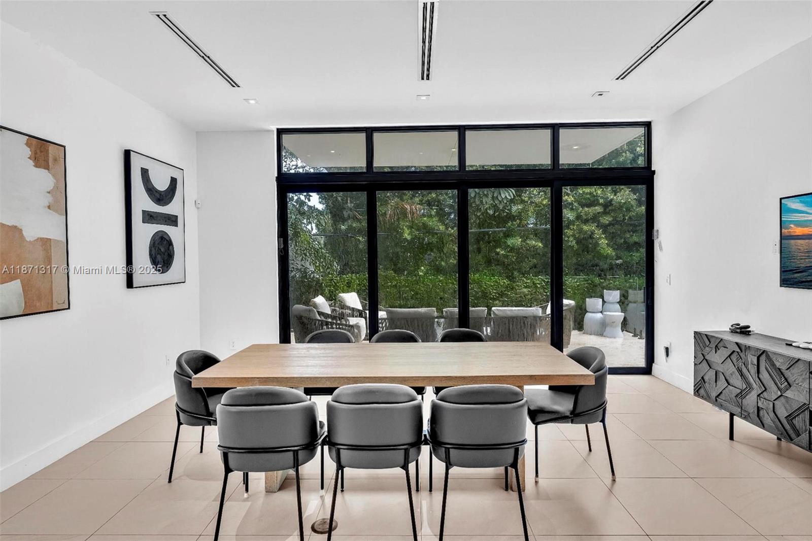 1350 98th Street Bay Harbor Islands, FL 33154 - Photo 7 of 46 a view of a dining room with furniture window and outside view