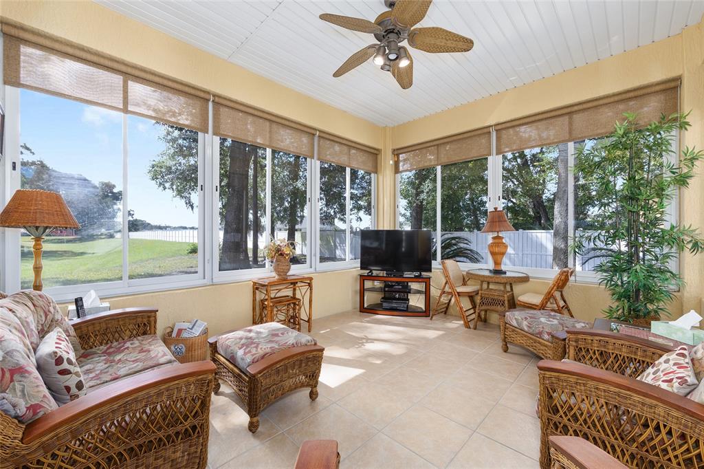 10751 Southwest 71st Circle Ocala, FL 34476 - Photo 24 of 52 a living room with furniture and a large window