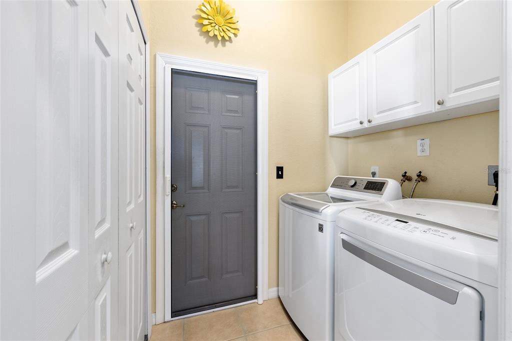 10751 Southwest 71st Circle Ocala, FL 34476 - Photo 29 of 52 a view of storage and utility room with washer and dryer
