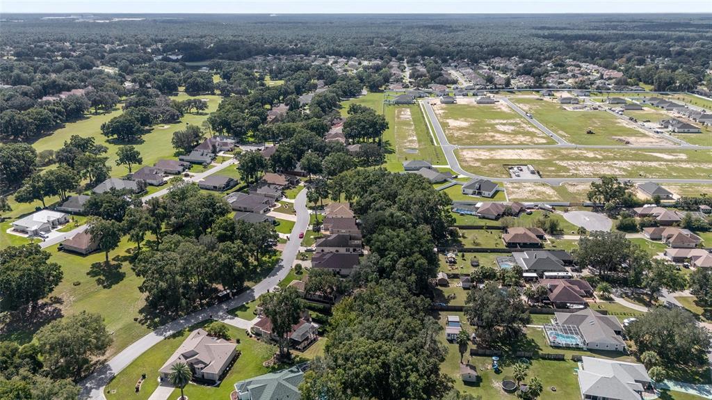 10751 Southwest 71st Circle Ocala, FL 34476 - Photo 37 of 52 an aerial view of residential houses with outdoor space