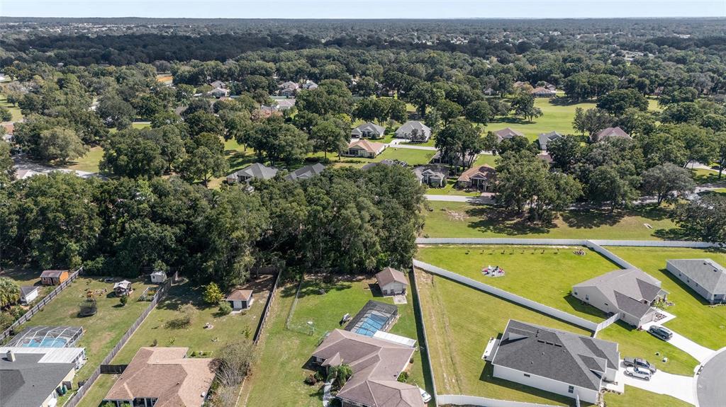 10751 Southwest 71st Circle Ocala, FL 34476 - Photo 39 of 52 an aerial view of residential houses with outdoor space