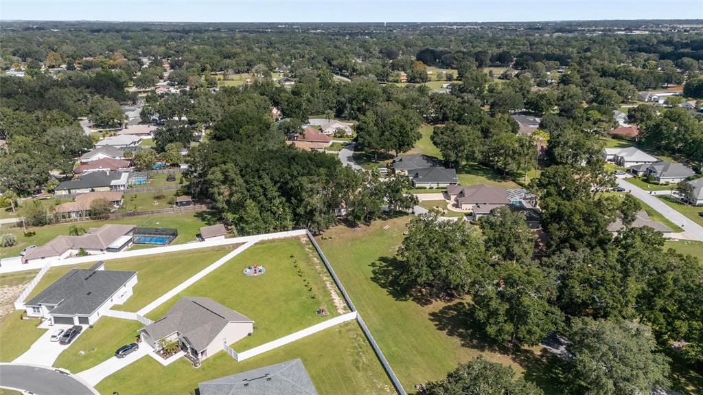 10751 Southwest 71st Circle Ocala, FL 34476 - Photo 40 of 52 an aerial view of residential houses with outdoor space