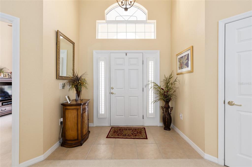 10751 Southwest 71st Circle Ocala, FL 34476 - Photo 4 of 52 a view of front door with a potted plant