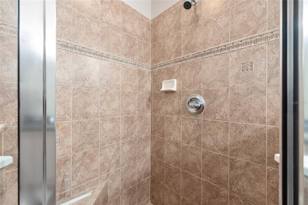 10751 Southwest 71st Circle Ocala, FL 34476 - Photo 6 of 52 a bathroom with a shower