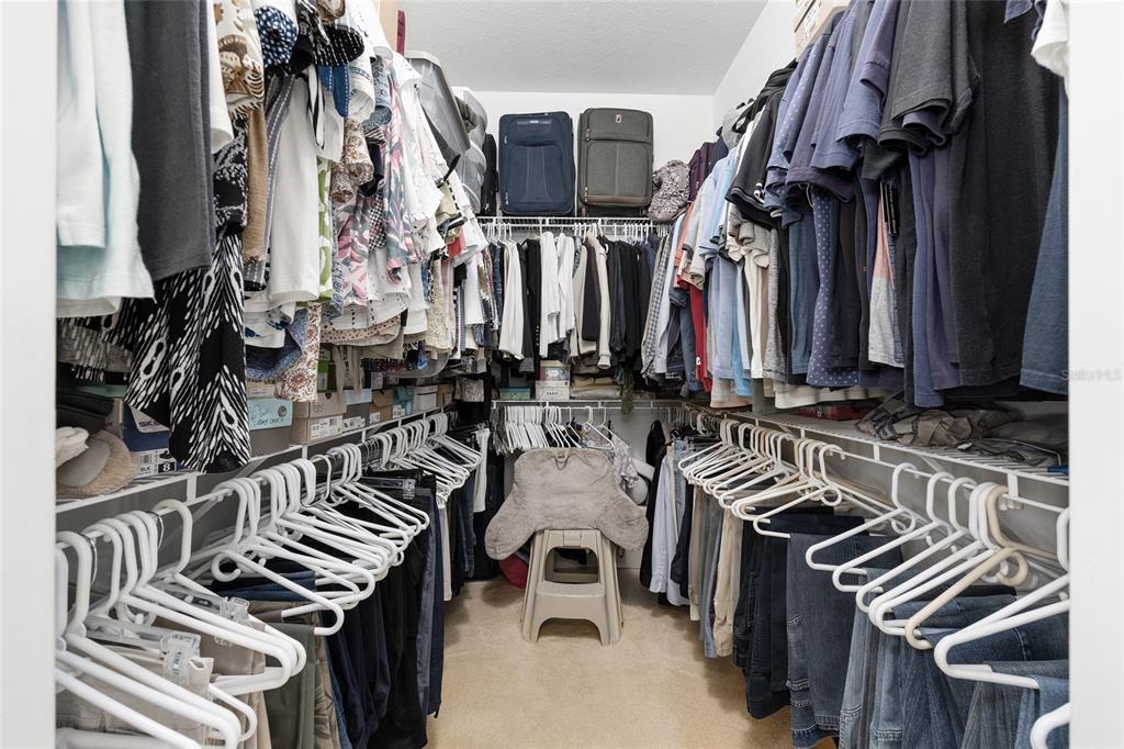 10751 Southwest 71st Circle Ocala, FL 34476 - Photo 10 of 52 a view of walk in closet with clothes