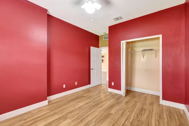a view of a livingroom with wooden floor