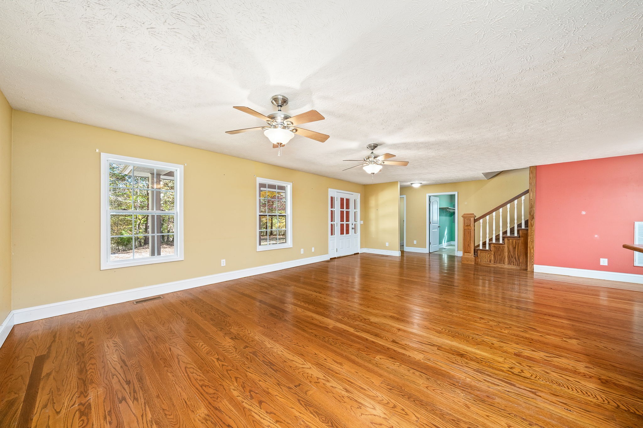 375 Golden Herren Road Sparta, TN 38583 - Photo 23 of 45 a view of an empty room with window and wooden floor