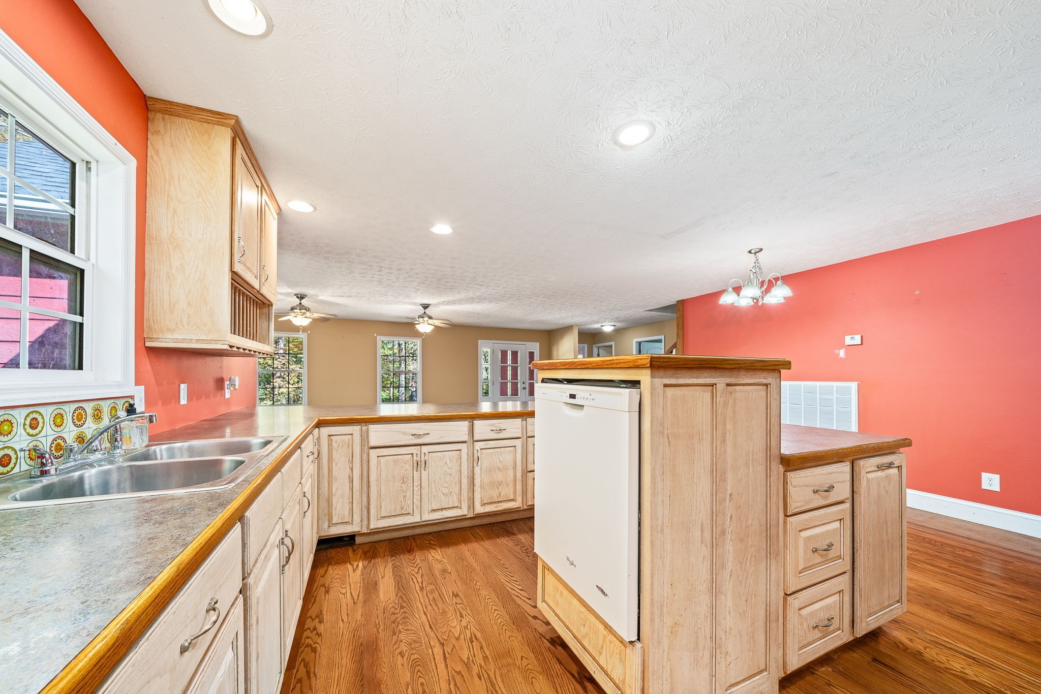 375 Golden Herren Road Sparta, TN 38583 - Photo 27 of 45 a kitchen with a refrigerator a stove and wooden cabinets
