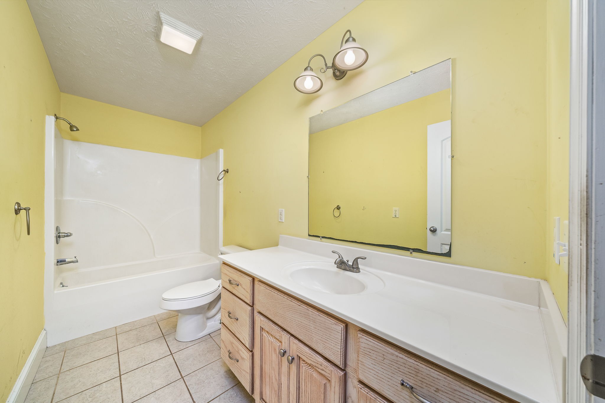 375 Golden Herren Road Sparta, TN 38583 - Photo 38 of 45 a bathroom with a granite countertop sink toilet and shower