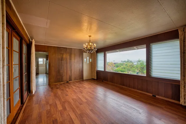 a view of gallery with wooden floor