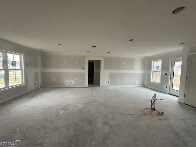 a view of a livingroom with a staircase