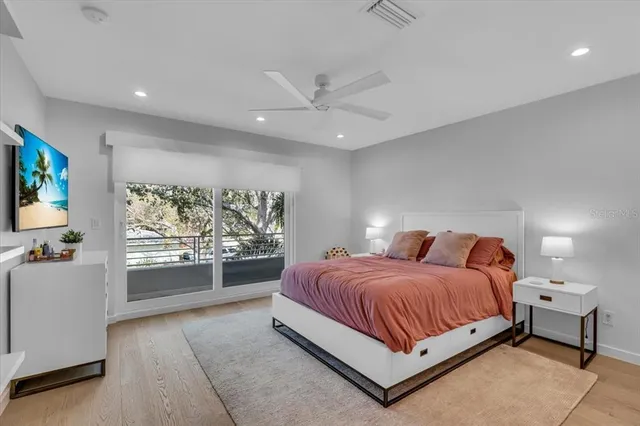 a view of a two chairs in the balcony