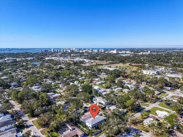 a picture of a bench in front of a wall
