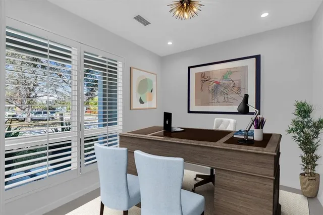 a kitchen with a sink a stove top oven and cabinets