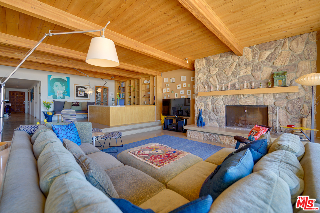 1 Spinnaker Street, Unit 2 Marina del Rey, CA 90292 - Photo 11 of 33 a living room with furniture and a fireplace
