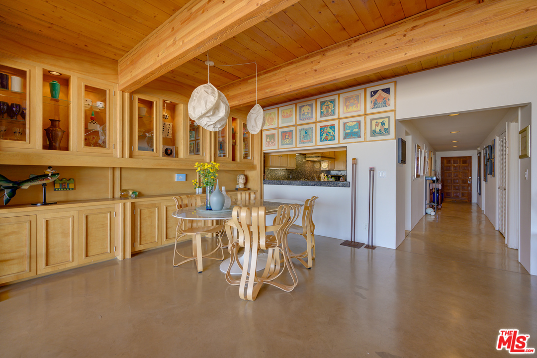 1 Spinnaker Street, Unit 2 Marina del Rey, CA 90292 - Photo 14 of 33 a view of a dining room with furniture and chandelier