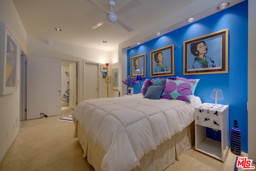 1 Spinnaker Street, Unit 2 Marina del Rey, CA 90292 - Photo 22 of 33 a bedroom with bed and paintings on the wall