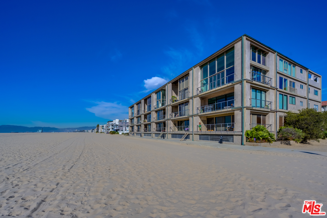 1 Spinnaker Street, Unit 2 Marina del Rey, CA 90292 - Photo 30 of 33 a front view of a building with streets and trees