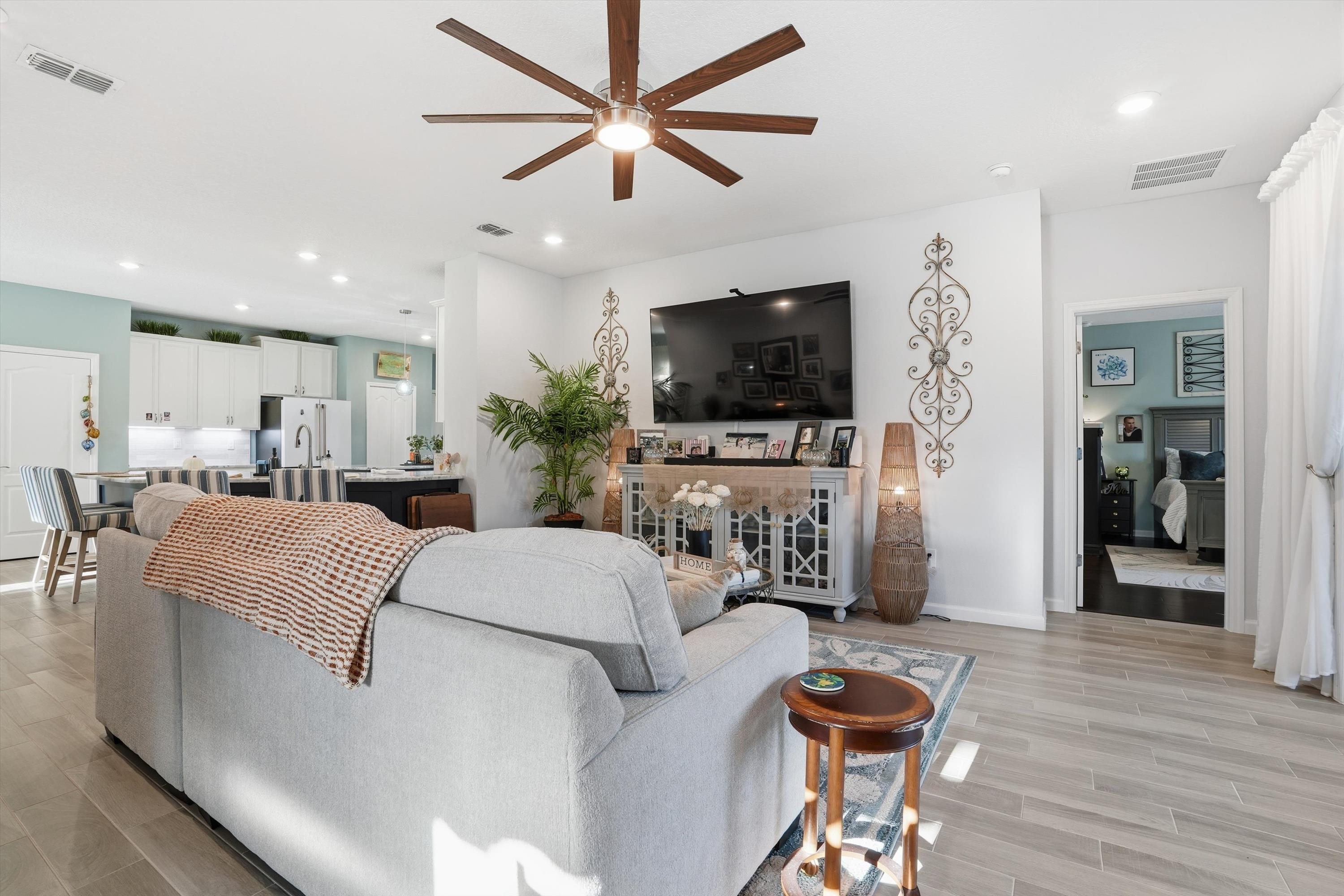 20 Trumpco Drive St. Augustine, FL 32092 - Photo 13 of 45 a living room with furniture and a flat screen tv