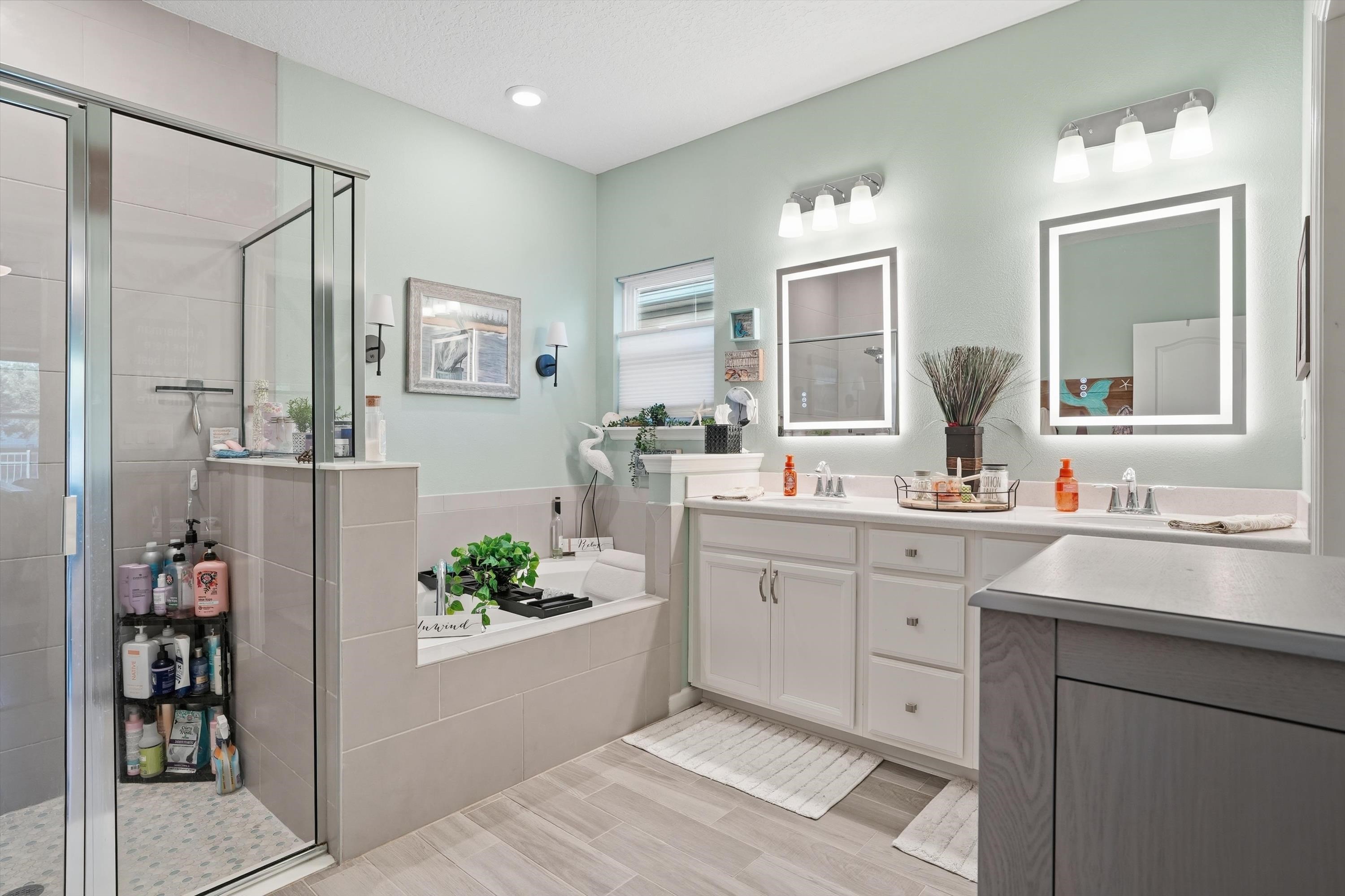 20 Trumpco Drive St. Augustine, FL 32092 - Photo 18 of 45 a spacious bathroom with a double vanity sink and a mirror