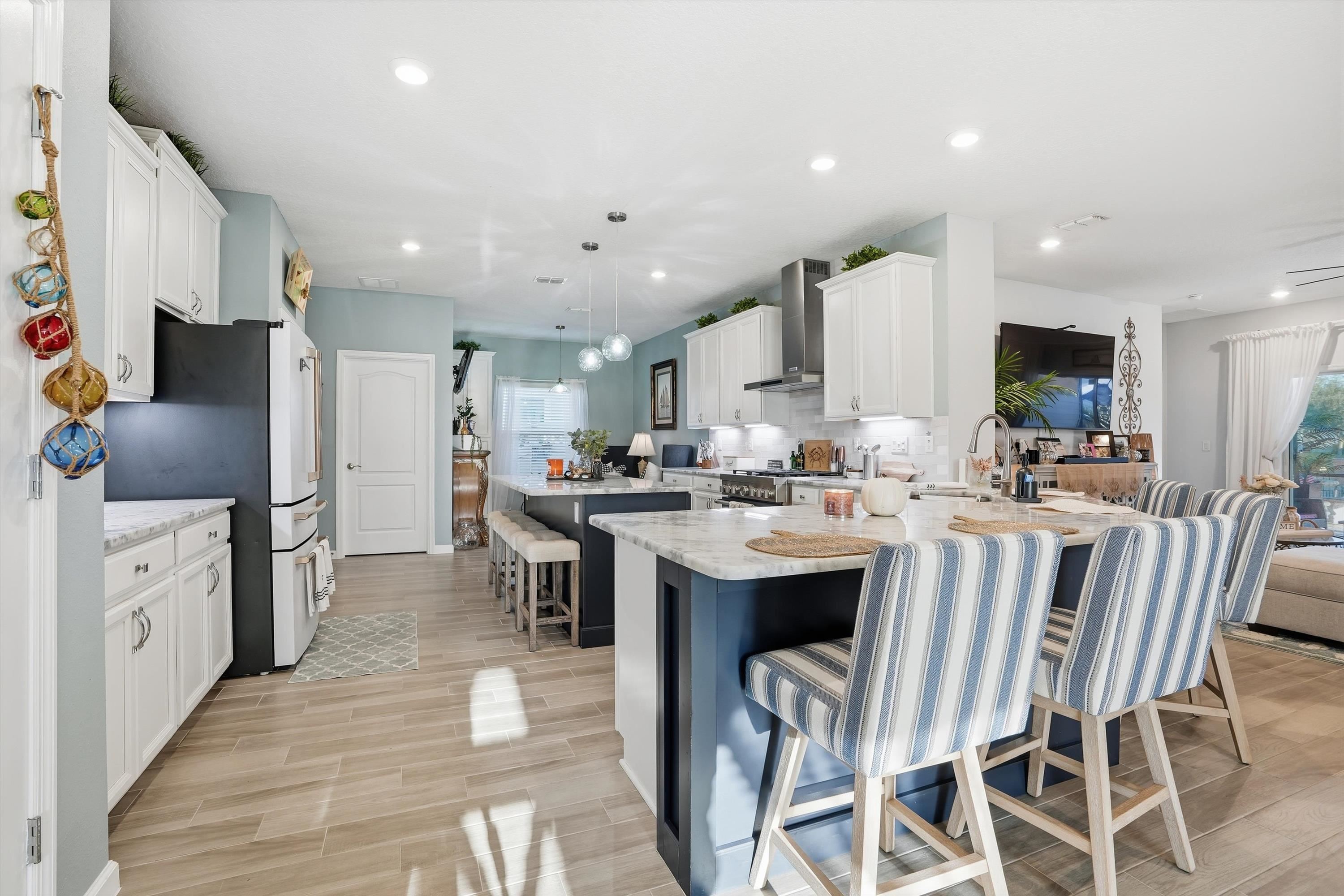 20 Trumpco Drive St. Augustine, FL 32092 - Photo 5 of 45 a kitchen with stainless steel appliances kitchen island granite countertop a sink and a refrigerator