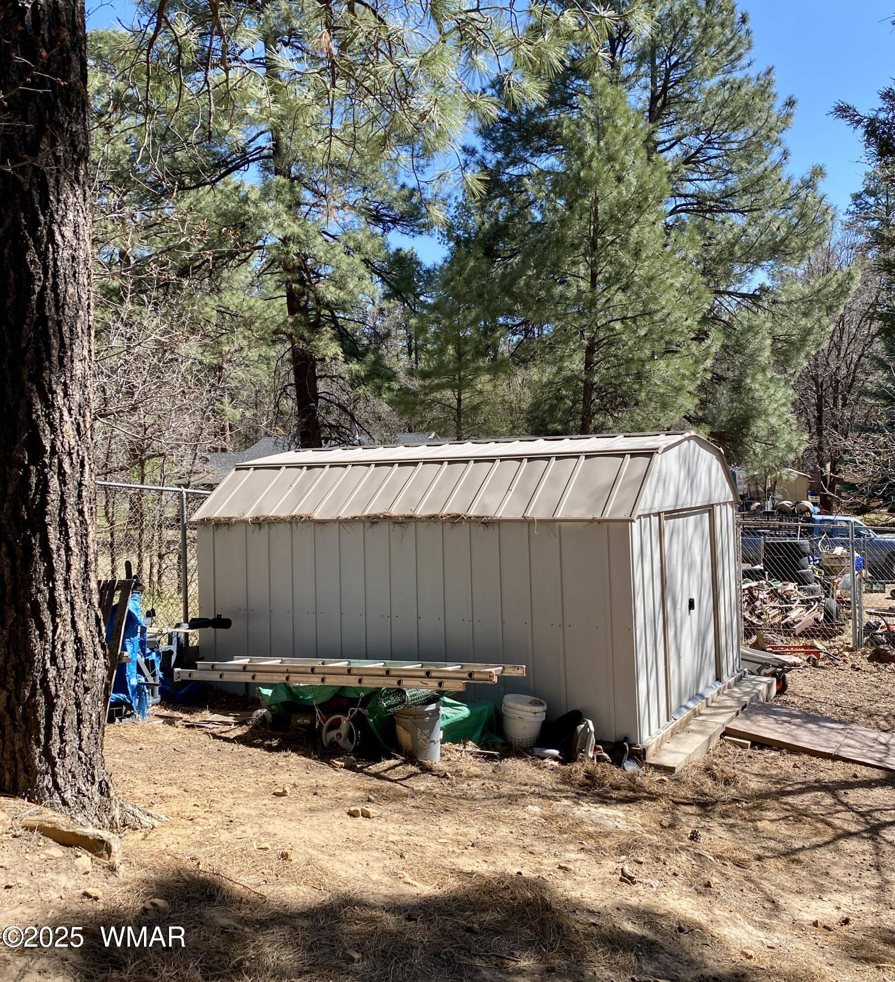 640 South Clark Road Show Low, AZ 85901 - Photo 17 of 18 Storage Shed