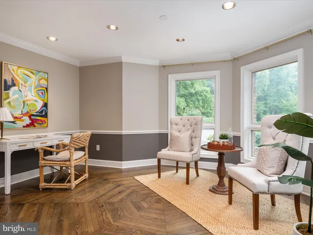 a white bath tub sitting next to a window