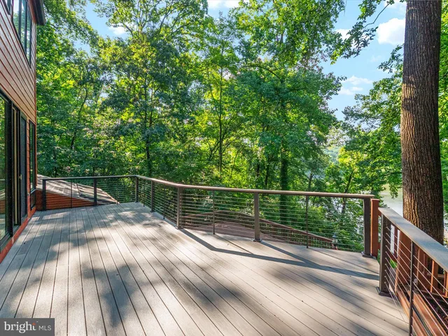 a front view of a house with car parked