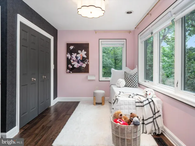 a room with furniture and a large window